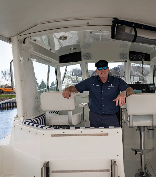 Captain preparing guests for a private Thousand Islands boat excursion